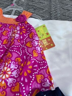 OP Girls Multi-Print Swimsuit Set with Pink Stripe Paw All of that.